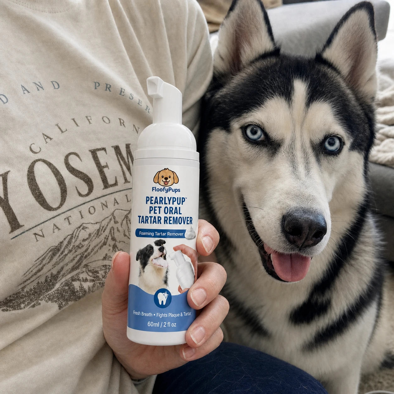 Customer using PearlyPup dental spray
