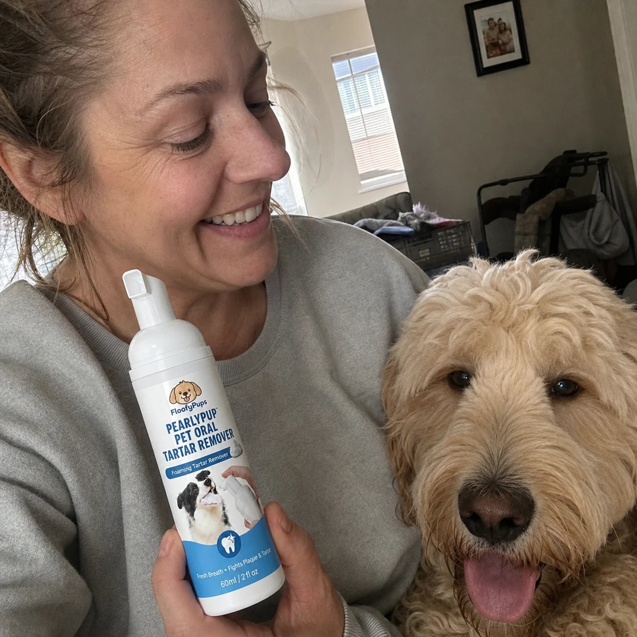 Customer using PearlyPup dental spray